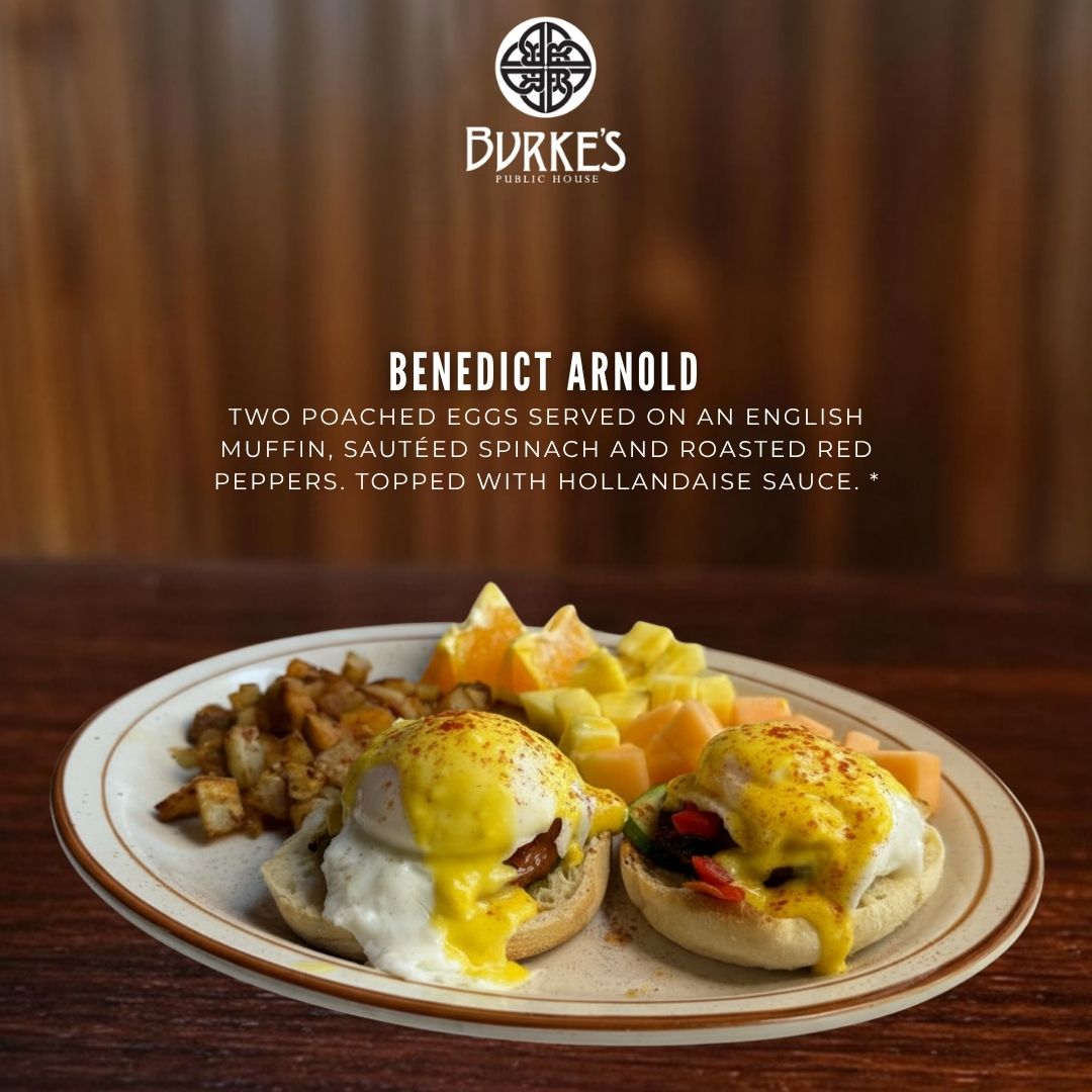 Benedict Arnold two poached eggs on an English muffin with sautéed spinach, roasted red peppers and hollandaise sauce at Burke's Public House in Edgewater Chicago