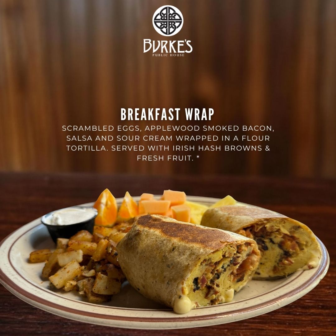 Breakfast wrap with scrambled eggs, applewood smoked bacon, salsa and sour cream in a flour tortilla served with Irish hash browns and fresh fruit at Burke's Public House in Edgewater Chicago