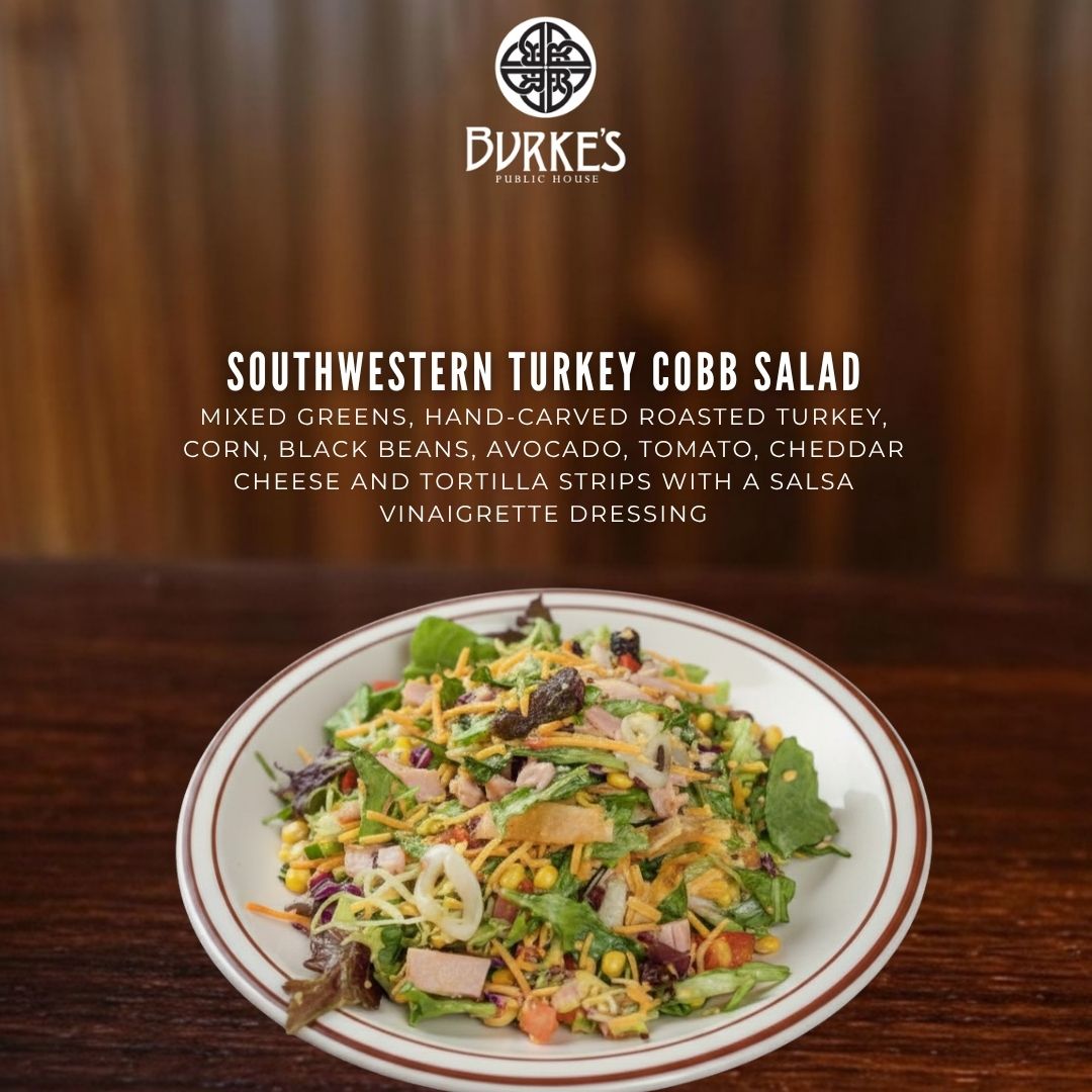 Southwestern Turkey Cobb Salad at Burke's Public House with mixed greens, hand-carved roasted turkey, corn, black beans, avocado, tomato, cheddar cheese, tortilla strips, and salsa vinaigrette dressing in Edgewater, Chicago