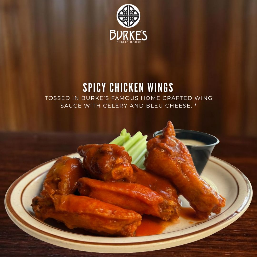 Spicy Chicken Wings tossed in Burke's famous home crafted wing sauce, served with celery and bleu cheese at Burke's Public House, Chicago IL 60640